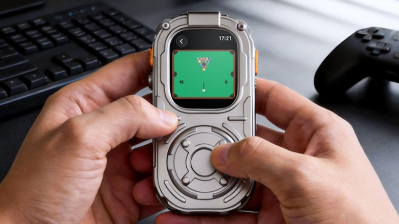 Close-up view of a person using the RePod Ultra's mechanical interface and screen.