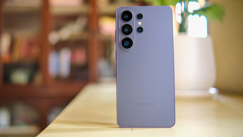 The Samsung Galaxy S26 Ultra smartphone standing upright on a flat surface.
