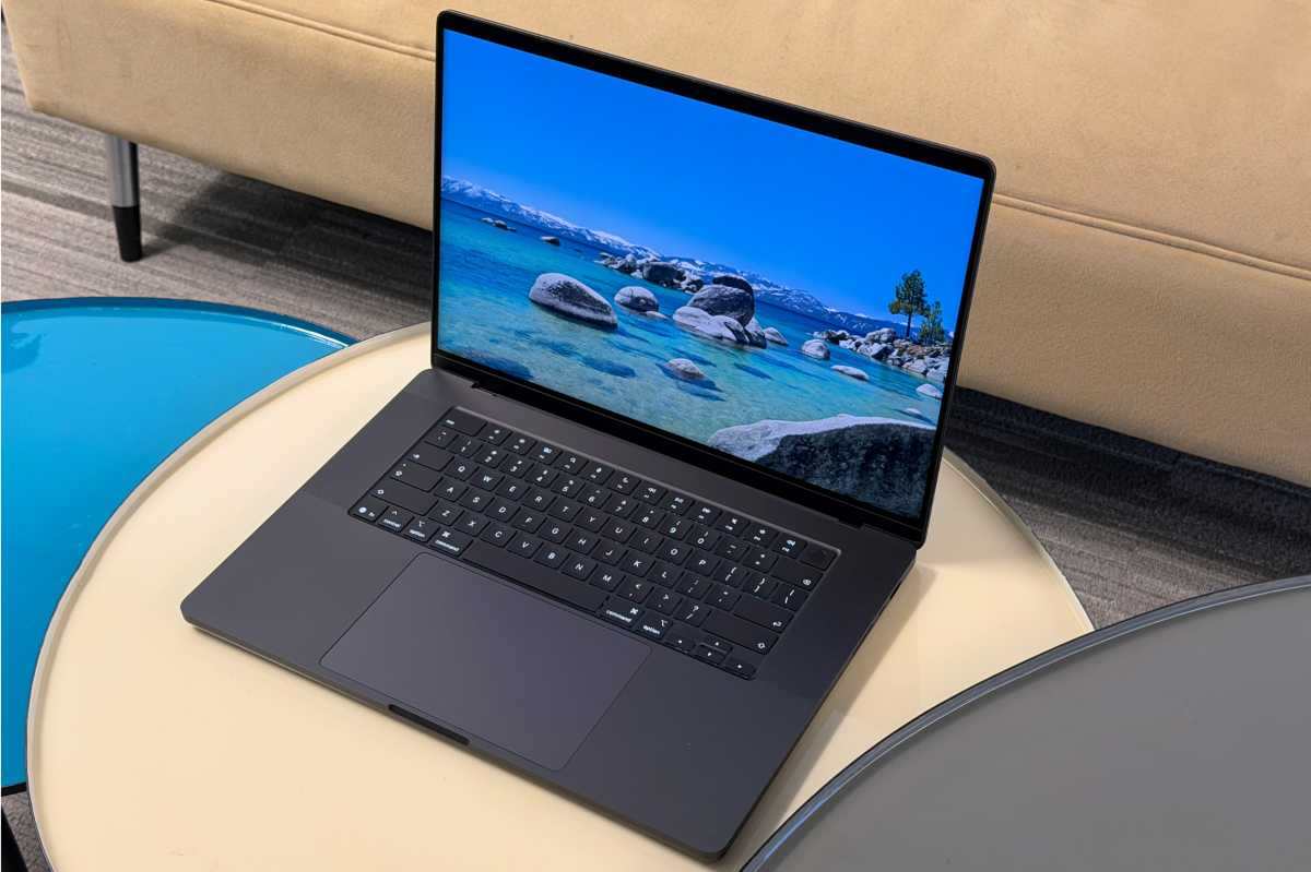 The 16-inch MacBook Pro with M5 Max chip, featuring multiple Thunderbolt 5 ports.