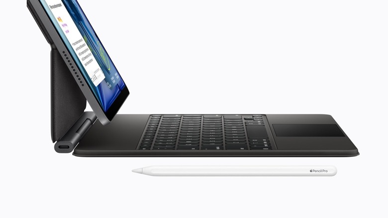 An M4 iPad Air with the Magic Keyboard and Apple Pencil Pro attached.