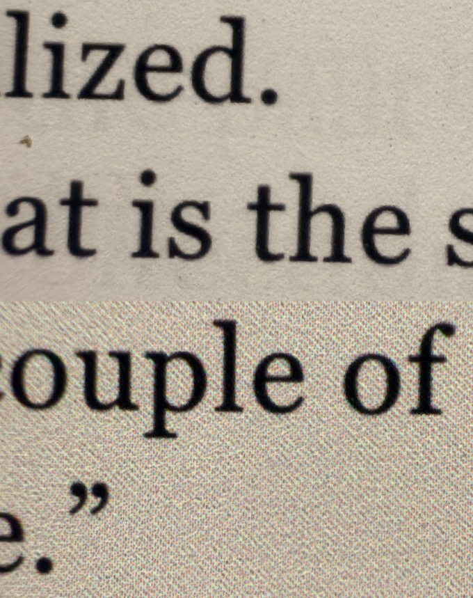 A close-up comparison of screen contrast between different Kindle models.