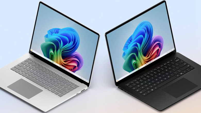 Silver and black Microsoft Surface Laptop models against a gradient background.