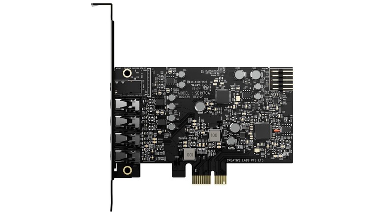 A Creative Sound Blaster Audigy Fx Pro PCIe sound card showing its audio capacitors and gold-plated jacks.