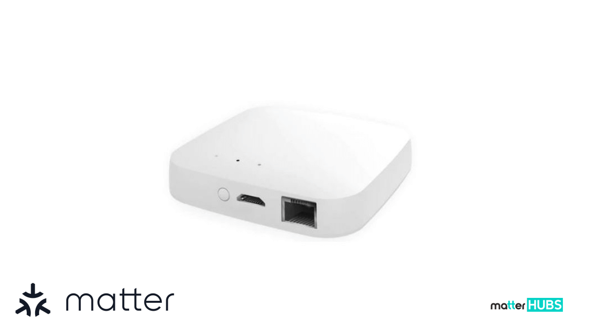A Moes brand smart home gateway sitting on a desk.