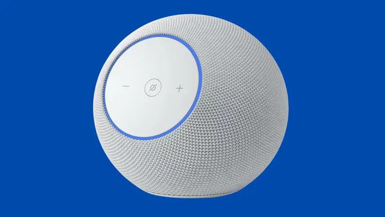 A white semi-sphere Amazon smart speaker against a dark blue background.