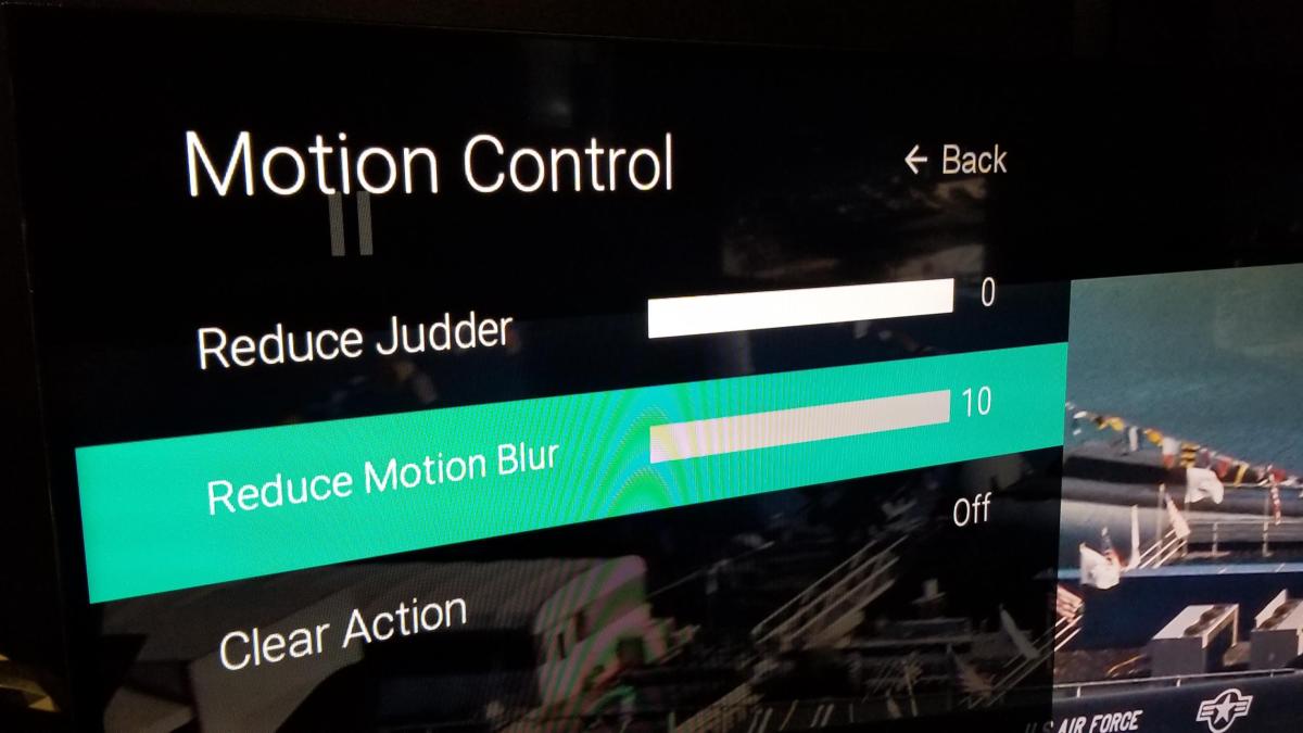 The Vizio TV menu showing Motion Control settings including Judder Reduction and Motion Blur.